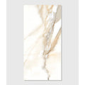 A rectangular beige and cream marble-effect porcelain tile with flowing natural veining from magnifique porcelain oro