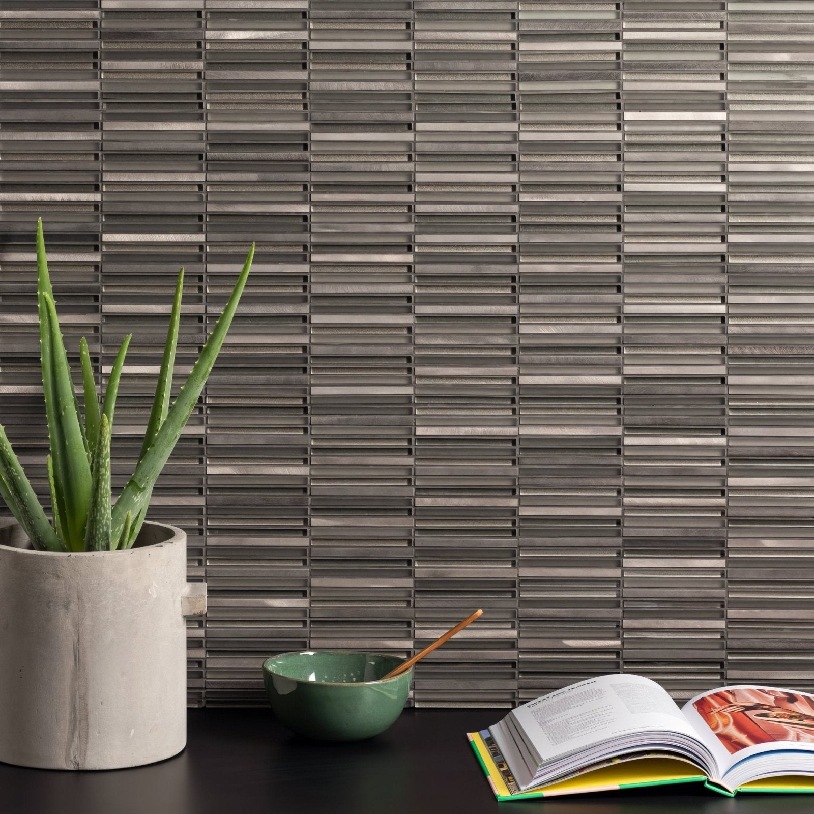 Majestic recycled glass and metal stack mosaic with sleek modern gray metallic horizontal slat tile wall