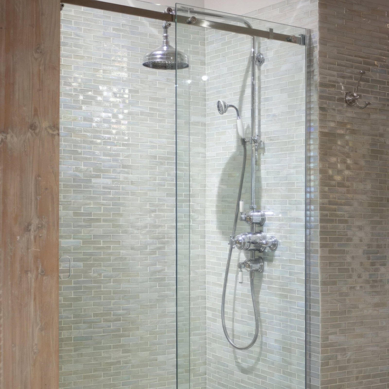 Malacassa Glacier Brick Glass Mosaic white brick glass mosaic with a chrome shower system
