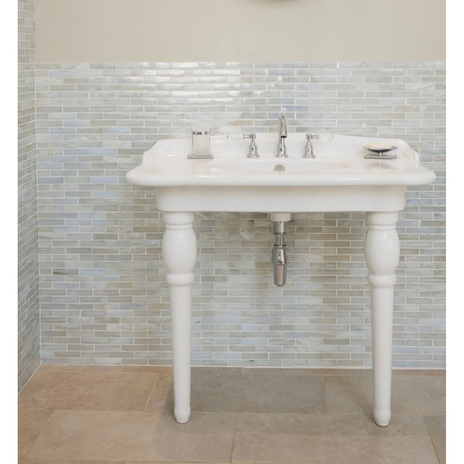 Malacassa Oasis Brick Glass Mosaic beige and grey brick glass mosaic with a white pedestal sink