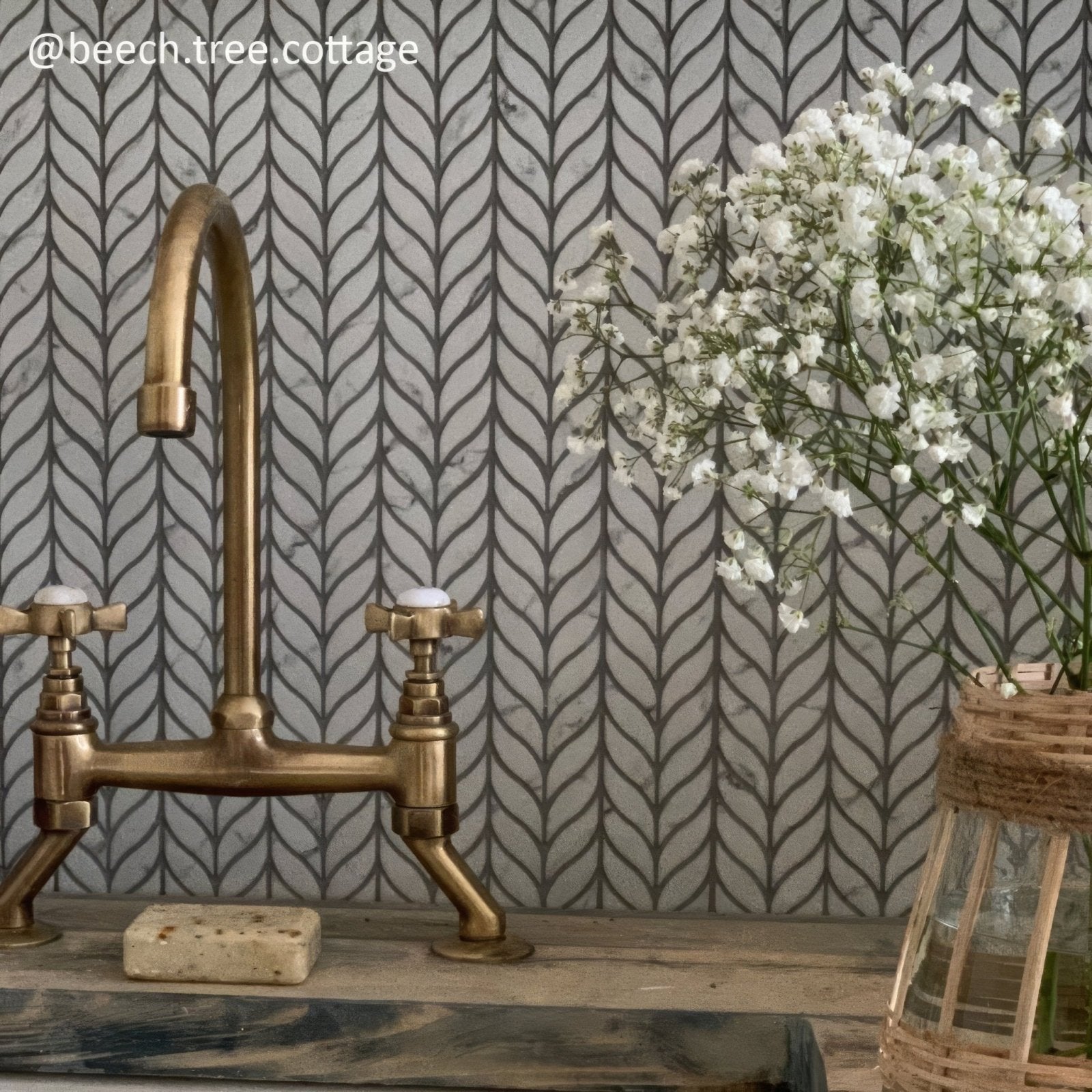 Malmo Willow Leaf White Mosaic white marble mosaic with an antique brass bridge tap