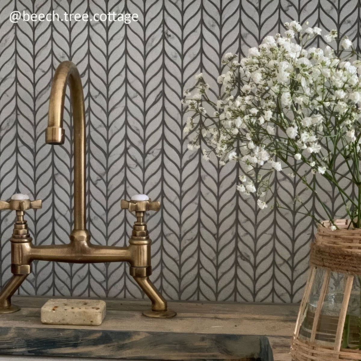 Malmo Willow Leaf White Mosaic white marble mosaic with an antique brass bridge tap