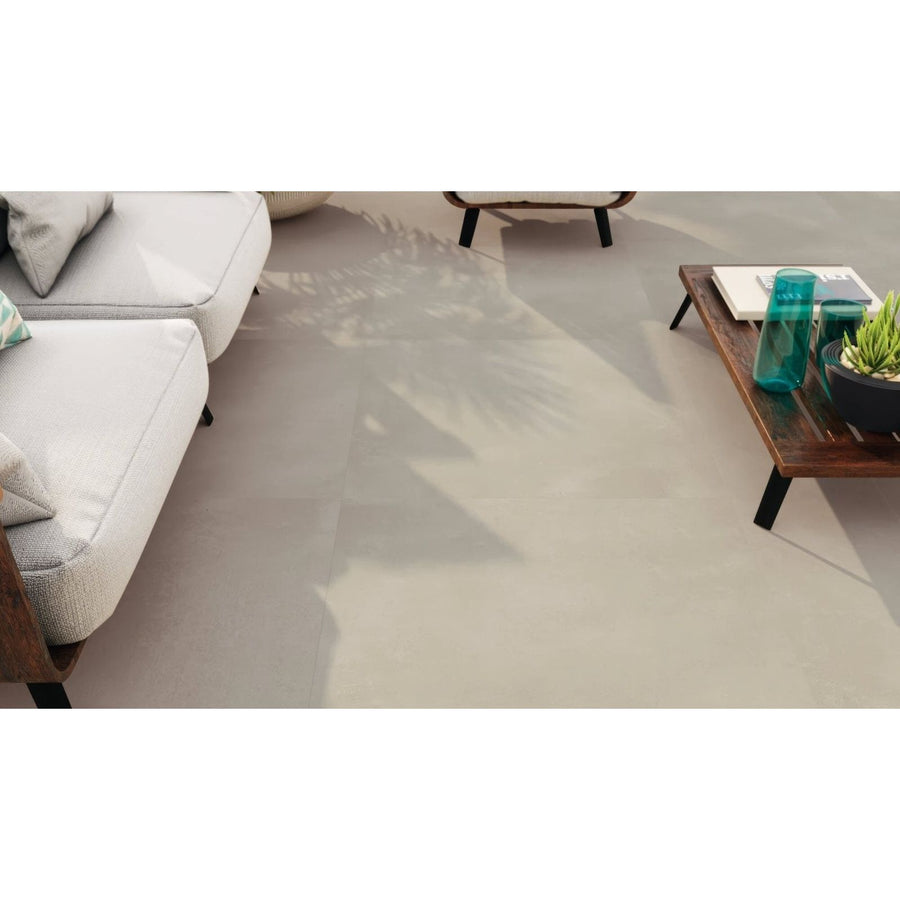 Beige matte-finish ceramic floor tiles with subtle shadow patterns from the manhattan 1800 arena matt collection