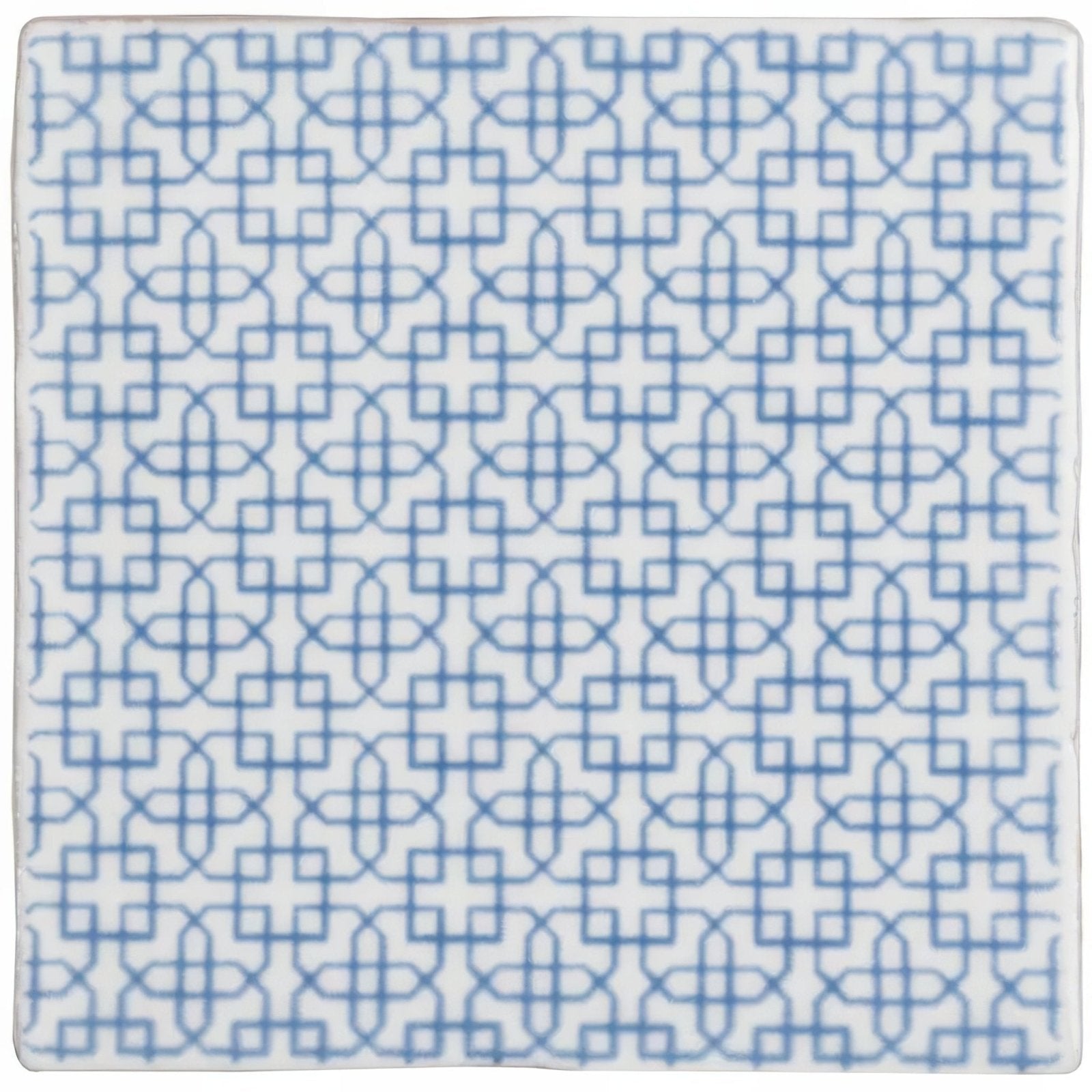 A square ceramic tile named Manoir Maroc on Papyrus with a repeating blue geometric pattern on a white background