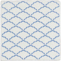White ceramic tile manoir nuage on papyrus with a repeating pattern of blue scalloped waves