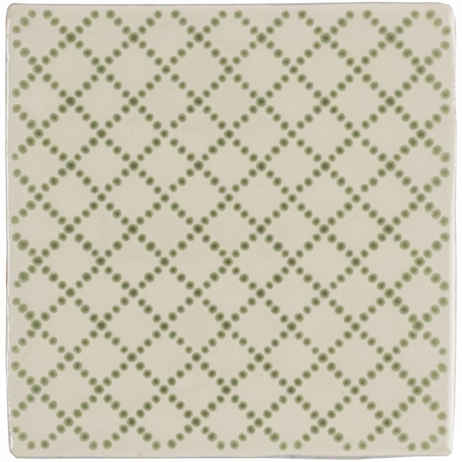 Cream-colored ceramic Manoir Trellis pumice coaster with subtle olive green diamond dot pattern for table protection