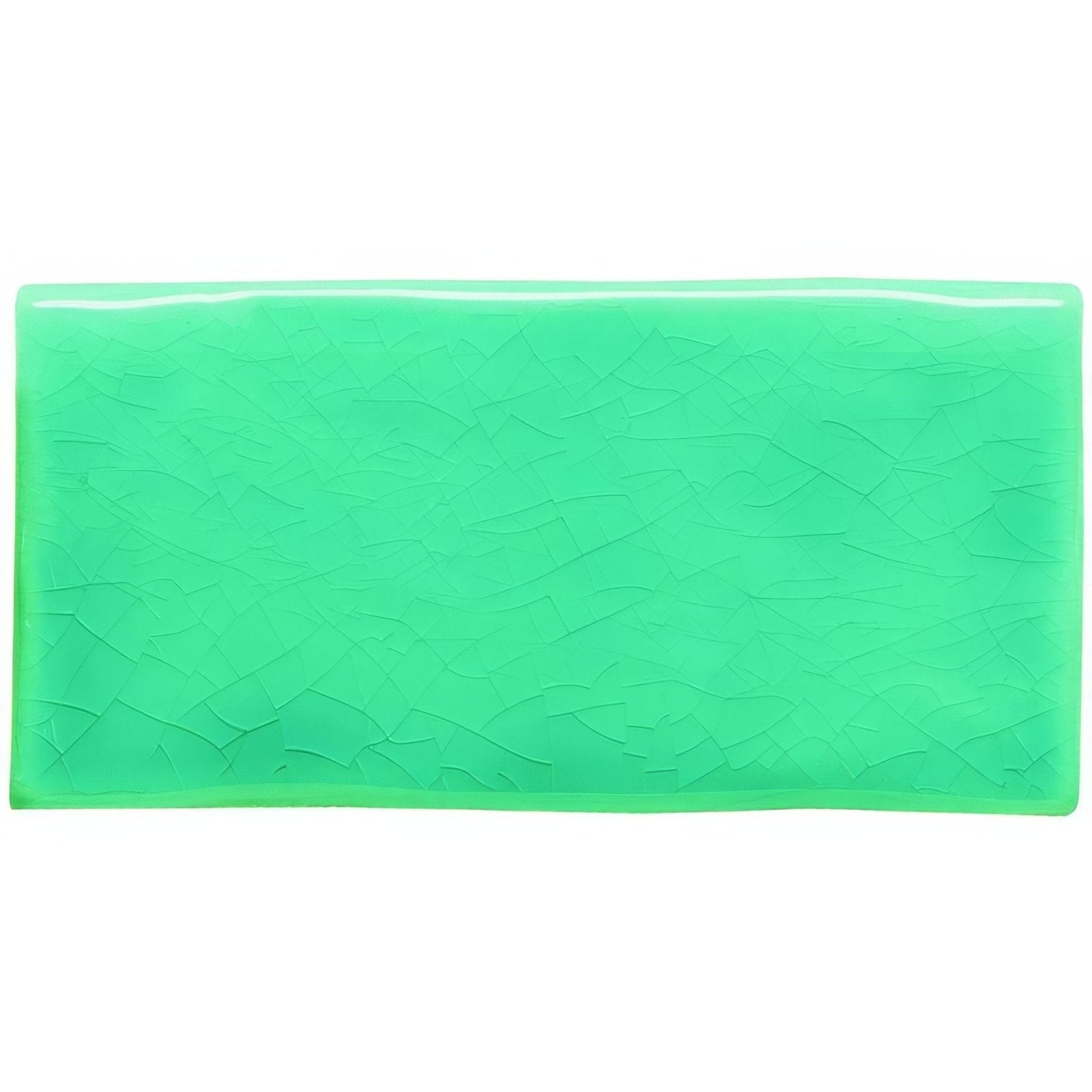 Marine blue half tile showing a rectangular translucent green gel pack with textured crackled surface
