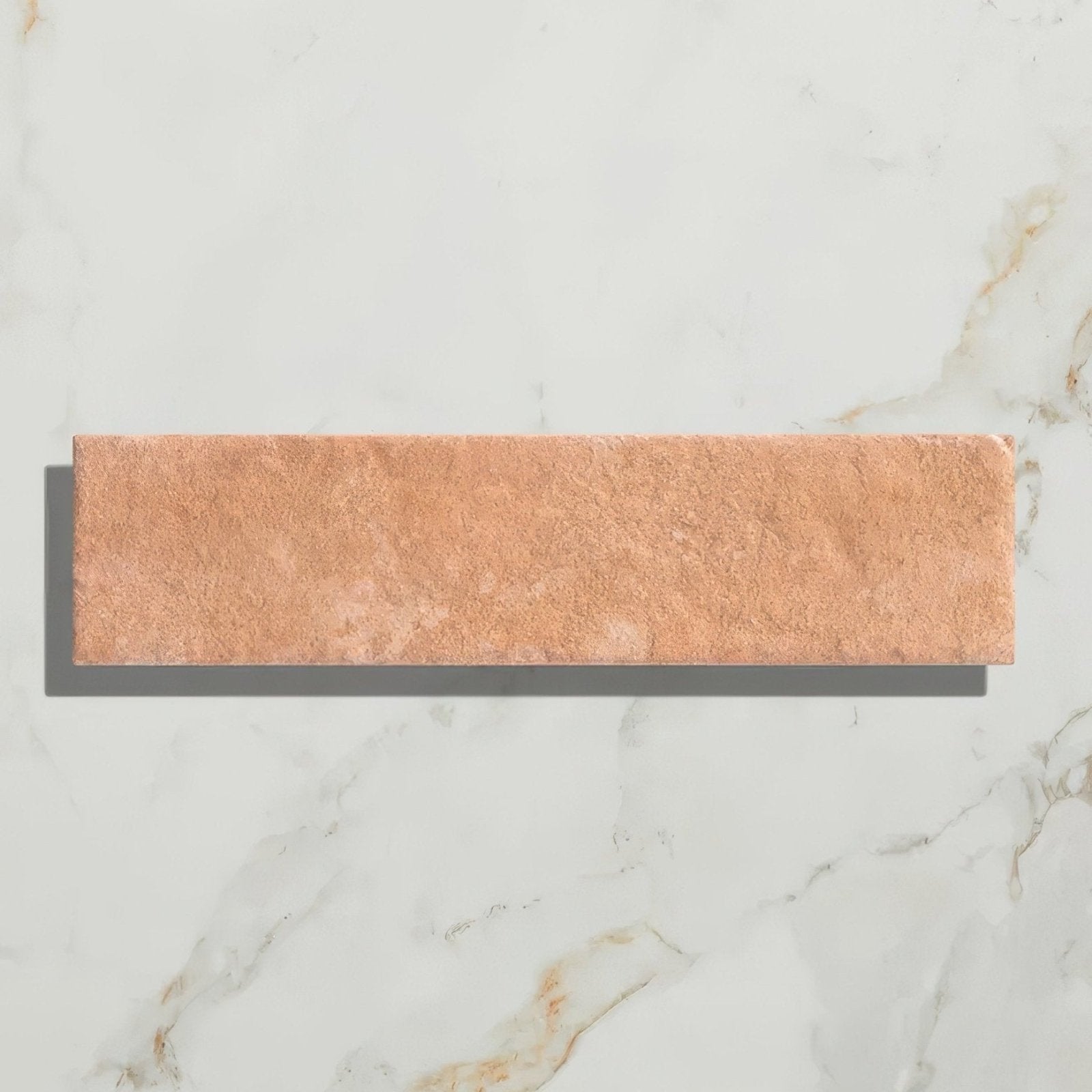 Copper-toned marlborough porcelain parquet natural rectangular tile with textured matte finish for flooring and walls