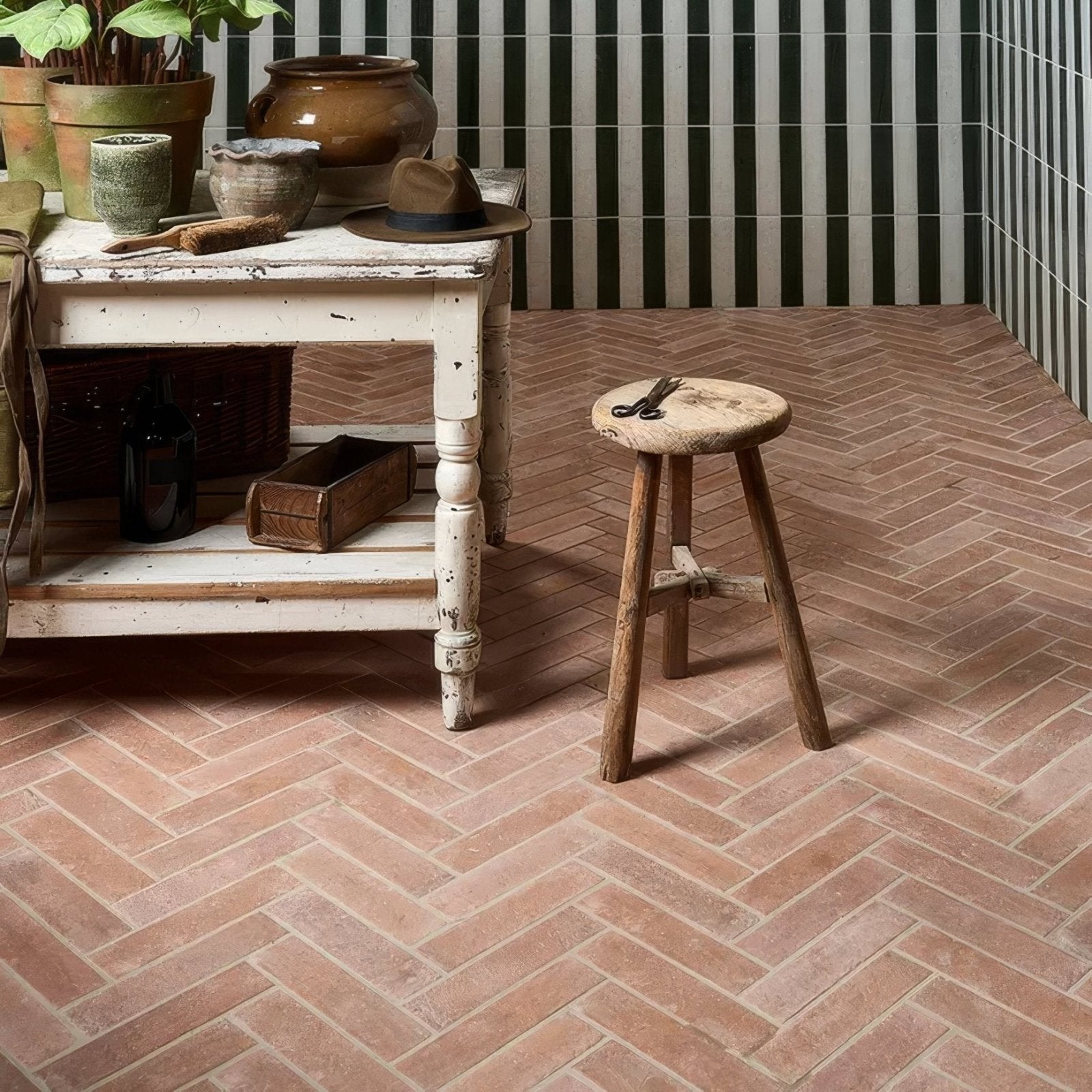 Terracotta colored marlborough porcelain parquet natural floor tiles with herringbone pattern for indoor flooring