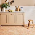Beige shaker cabinet with marble countertop and brass knobs showcasing marlborough terracotta arabesque design