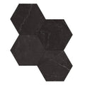 Dark gray hexagonal honed marble mosaic tiles with subtle white veining in marmi nero honed hexagon mosaic