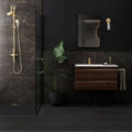 Marmi Nero Polished 60 x 60cm dark grey marble-effect porcelain tiles with a floating vanity and gold tap