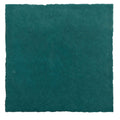 A square textured teal ceramic tile with slightly uneven edge from maroc ceramic aquamarine collection