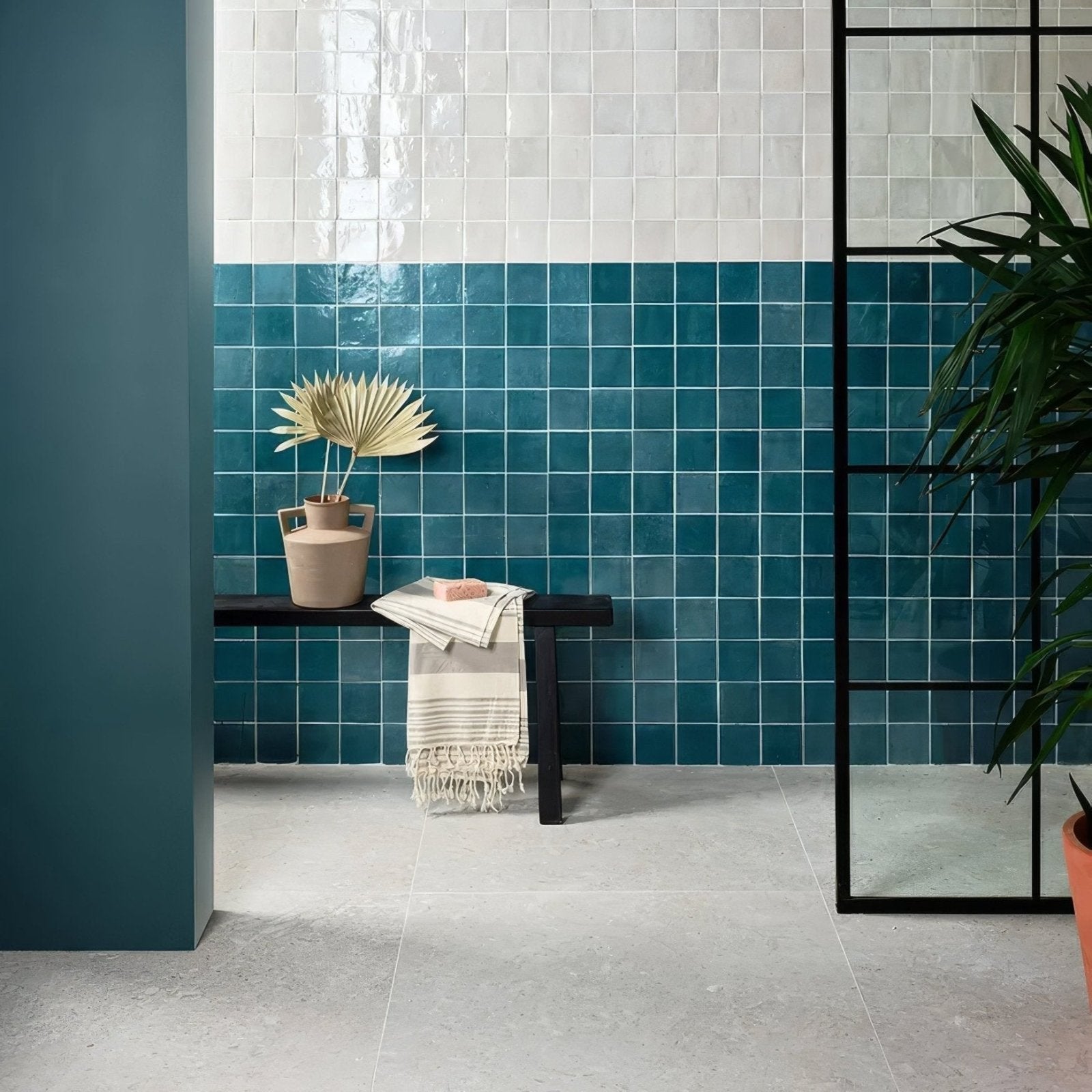 Teal glossy ceramic maroc ceramic bianco tiles with a white tile accent wall for stylish wall design