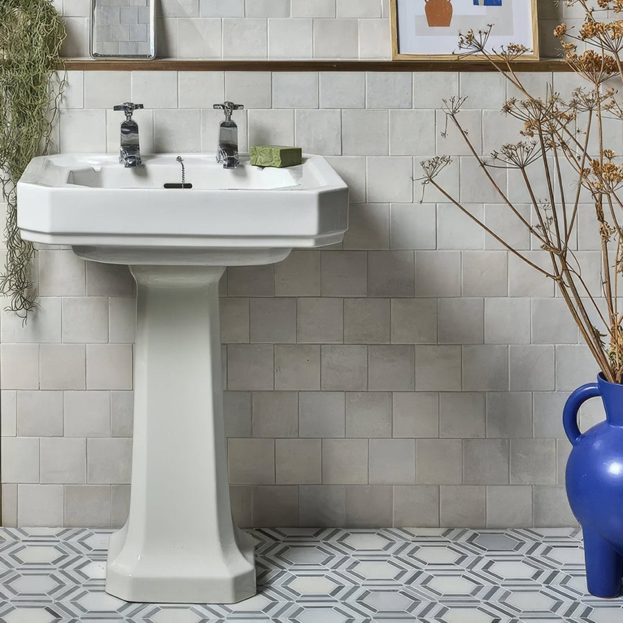 Maroc ceramic bianco white ceramic pedestal sink with a classic rectangular basin and two chrome faucets