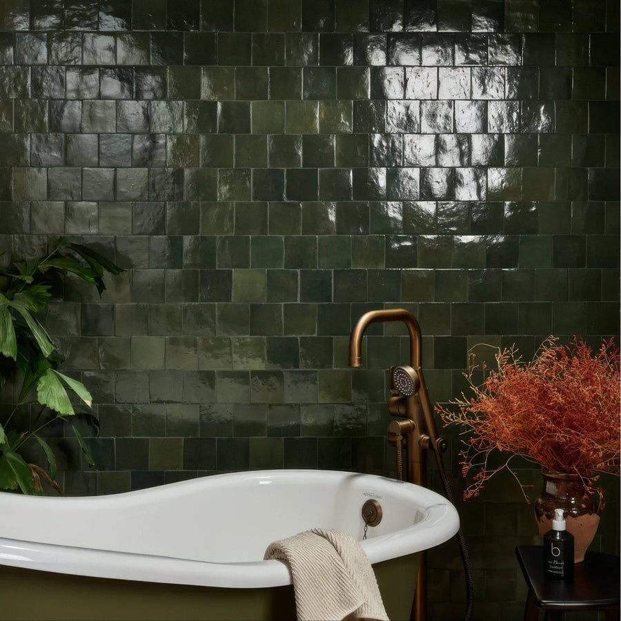 Glossy dark green square ceramic tiles with subtle gradient and reflective surface from Maroc Ceramic Forest collection
