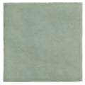 A square matte-finished ceramic tile in soft sage green from Maroc Ceramic Mint collection