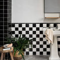Maroc Ceramic Nero black and white ceramic tiles with a white pedestal sink