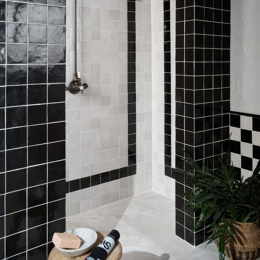 Maroc ceramic nero black and white tiled shower wall with brass faucet featuring ceramic material and elegant design