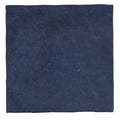 Dark blue suede square napkin complementing maroc ceramic oltremare dinnerware collection