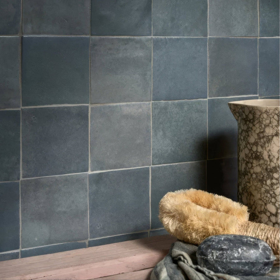 Dark gray textured ceramic tiles with subtle tone variations and matte finish from maroc ceramic powder blue collection