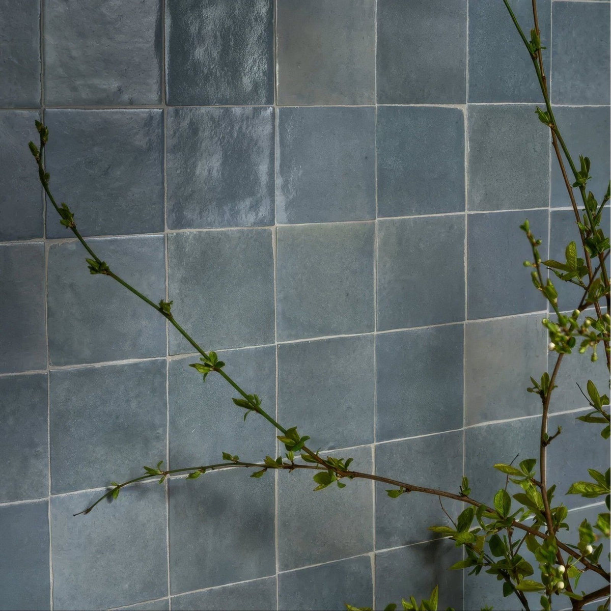 Gray square ceramic tiles with matte slightly textured finish used for wall in maroc ceramic powder blue collection