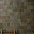Maroc ceramic sage earthy-toned square ceramic tiles in muted green and gray hues arranged in a uniform grid