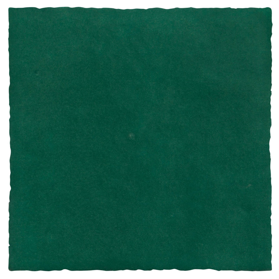 Maroc ceramic teal tile in deep green with textured surface and slightly irregular edges for decorative use