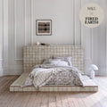 Beige ceramic tile bed platform with matching headboard and base featuring subtle grid pattern in marrakech cream terracotta base tile 11.8cm