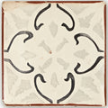 Cream-colored ceramic Marrakech Mabrouka patterned terracotta tile with black floral design and rustic reddish-brown border
