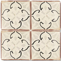 Cream-colored Marrakech Mabrouka patterned terracotta tile with black hand-painted floral patterns and rustic brown border