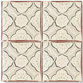 Four square cream terracotta tiles with dark brown floral outlines and green accents in the marrakech menara pattern