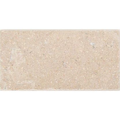 Temple Marsa sandblasted and brushed limestone tile surface detail, light beige natural stone