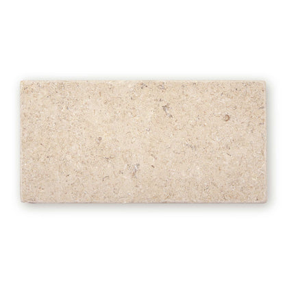 Temple Marsa tumbled limestone tile 10 x 20cm — light beige natural stone with fossils and veining