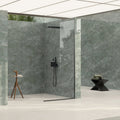 Marvel Diva Aqua Polished green marble-effect tiles with a black showerhead