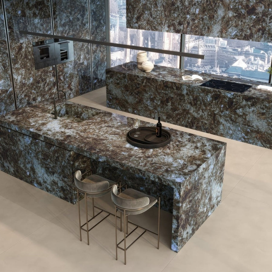 Marvel Diva Baobab Polished dark marble-effect tiles with a kitchen island