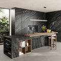 Marvel Diva Black Tempest Velvet dark grey marble-effect tiles with a kitchen island and wooden shelves