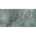 A sleek marvel diva galaxy polished marble slab in light teal with subtle brown veining and a polished finish