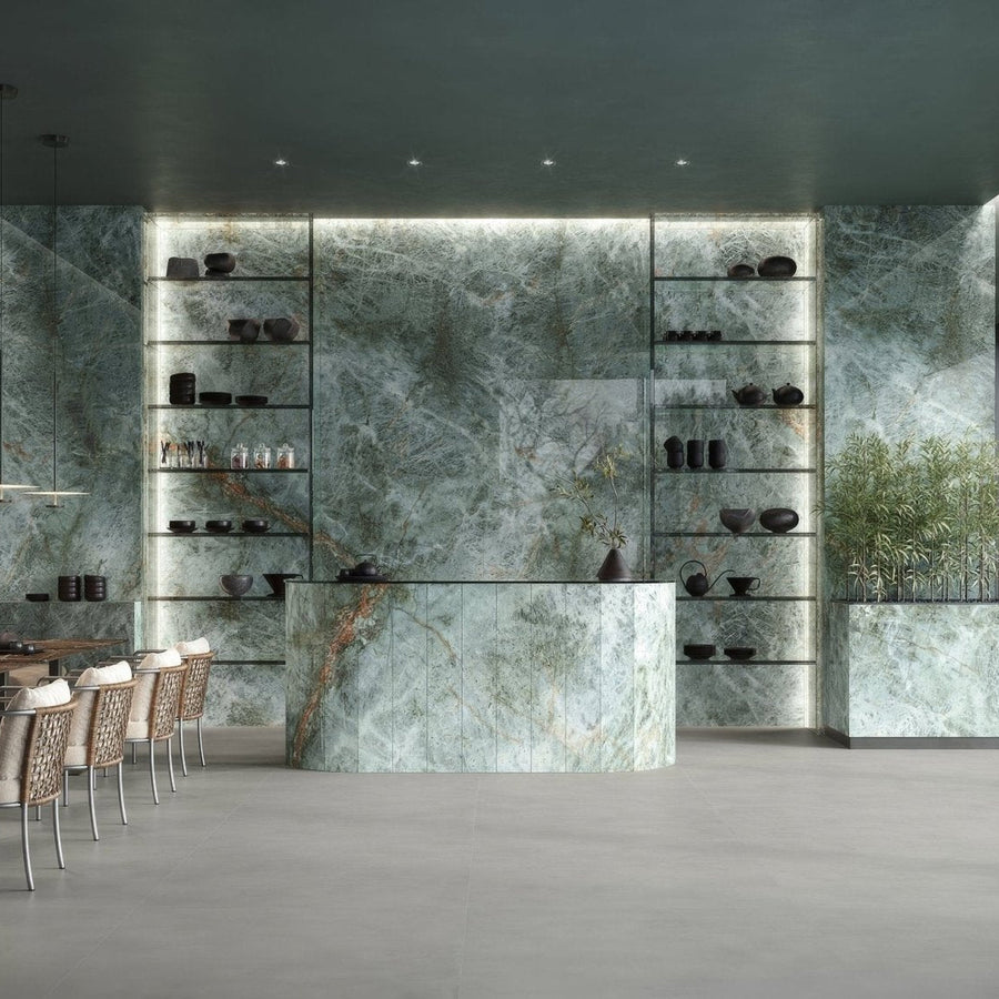 Marvel Diva Galaxy Polished green marble-effect tiles on a curved reception desk