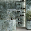 Marvel Diva Galaxy Polished green marble-effect tiles with a brown ceramic vase