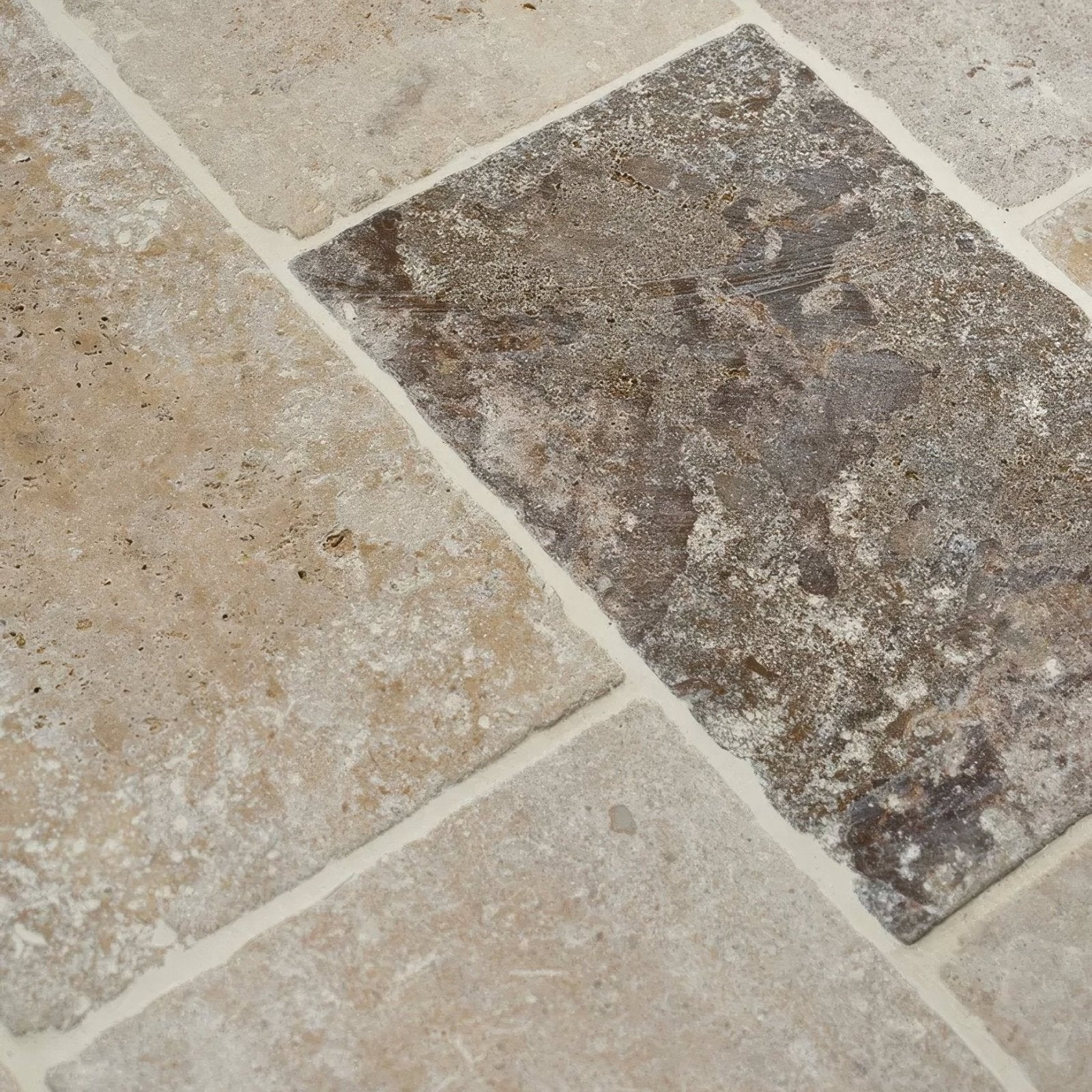 Beige and dark gray vieux bourgogne limestone cobbles with rustic textured weathered finish stone tiles
