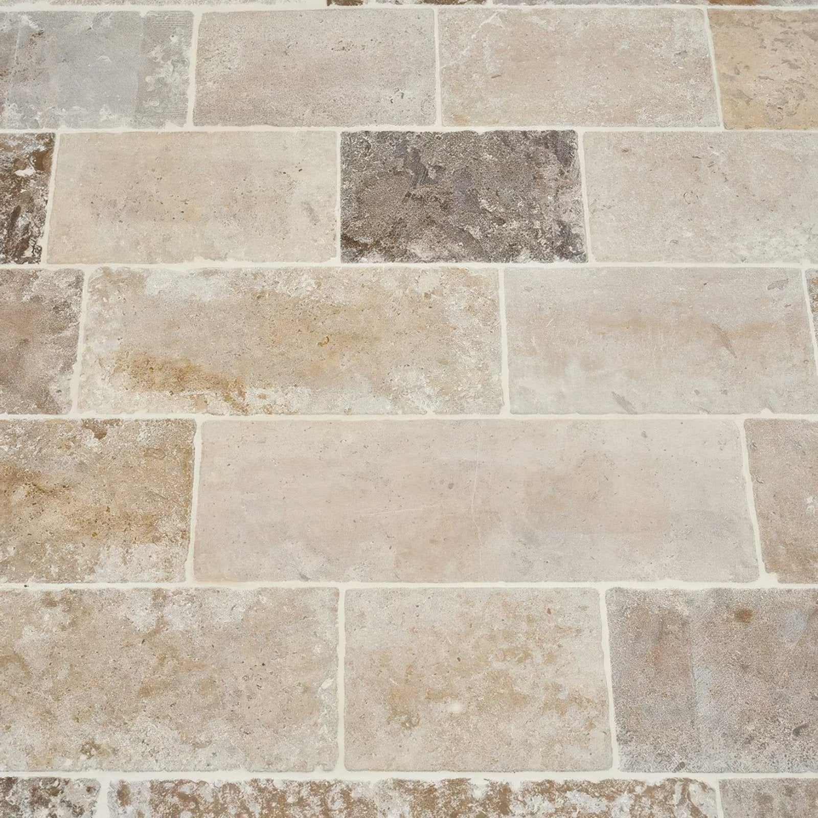 Beige and gray vieux bourgogne limestone cobbles with a weathered finish and natural rustic texture