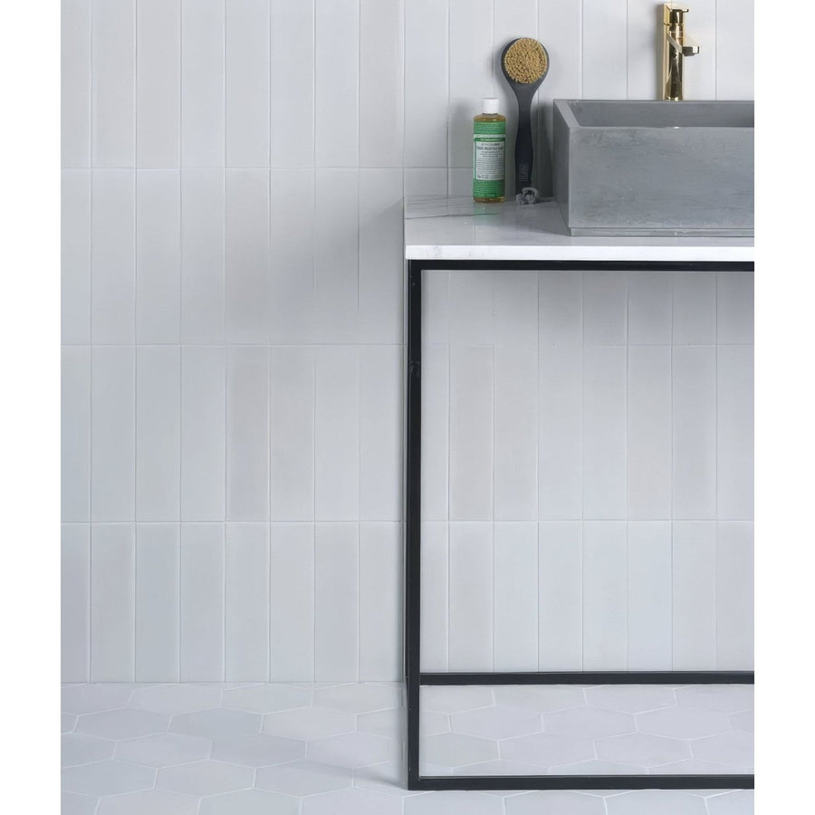 White rectangular porcelain subway tiles with smooth glossy finish on bathroom wall Medina Brick Porcelain Latte