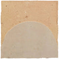 A beige semi-circular handmade Moroccan zellige tile with a textured surface and slightly uneven edges called Medina Cloudy White Belen