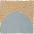 A square ceramic medina cornflower blue belen handmade moroccan zellige tile with a matte light blue semi circular design on beige