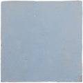 Medina cornflower blue square handmade moroccan zellige tile made of light blue ceramic with textured surface and imperfections