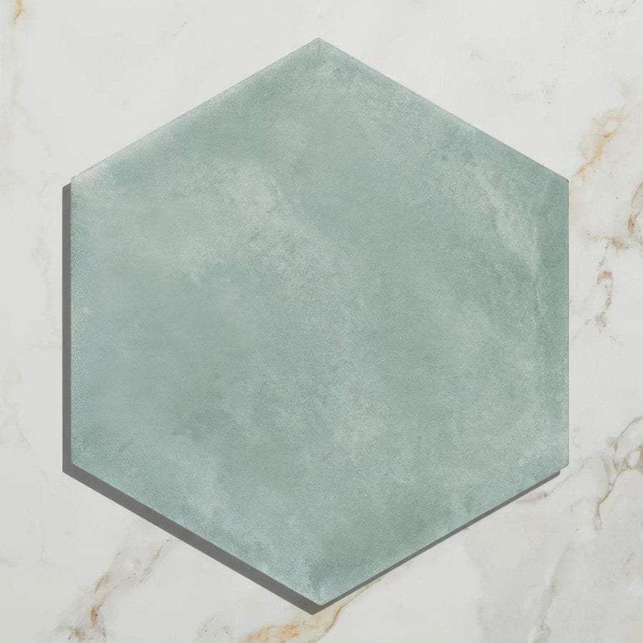 Medina hexagon porcelain tile with matte muted teal finish and subtle texture in salvia color