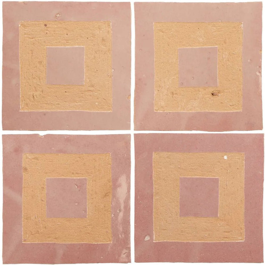 Set of four handmade Moroccan zellige tiles with matte pink leather surface and gold leaf concentric squares center