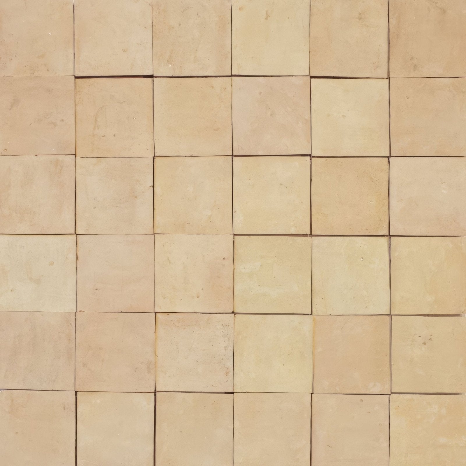 Beige square medina raw handmade Moroccan zellige tile with a subtle textured surface and natural stone finish