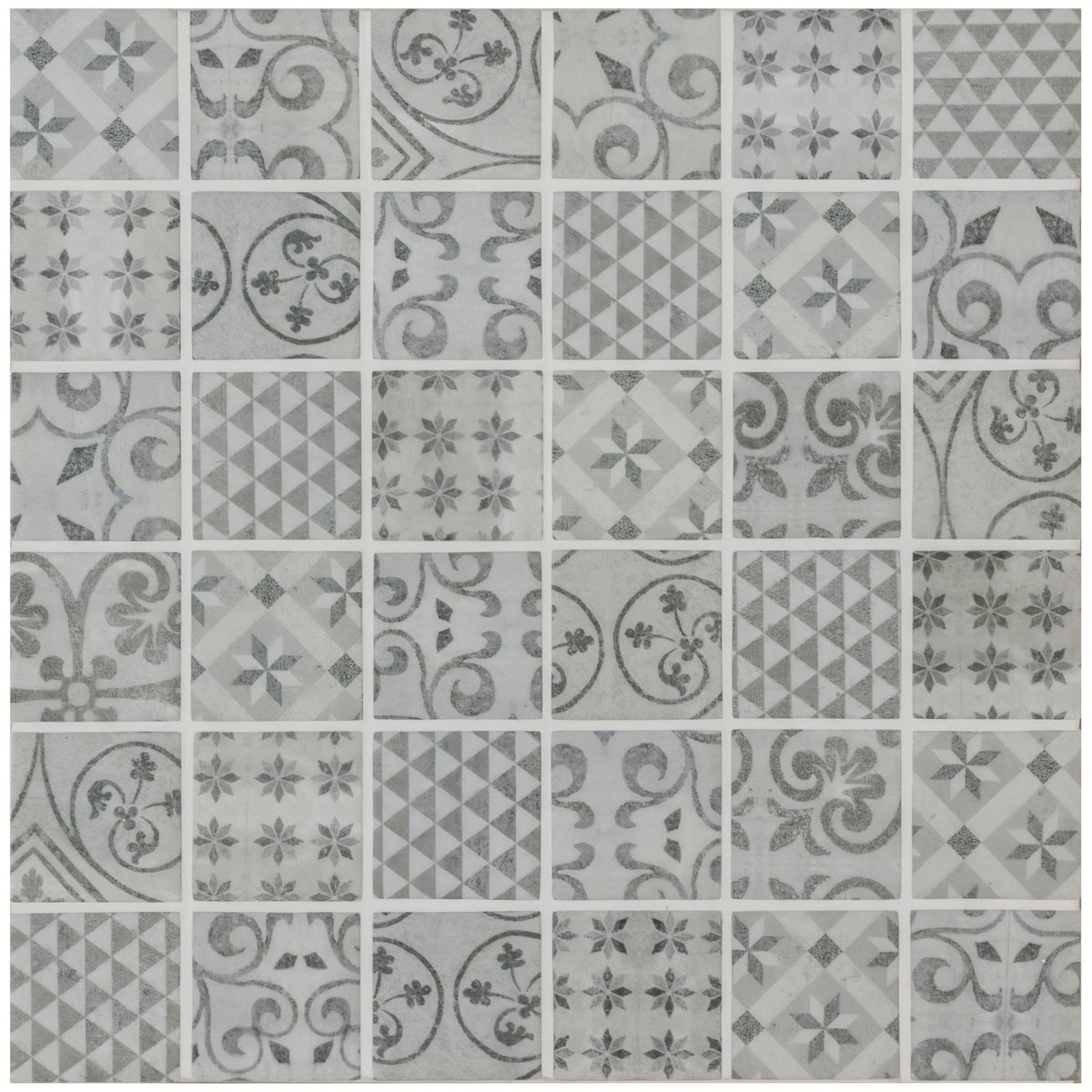 Medine patterned mosaic gray mosaic tile with vintage inspired patterns in varying shades of gray on light background